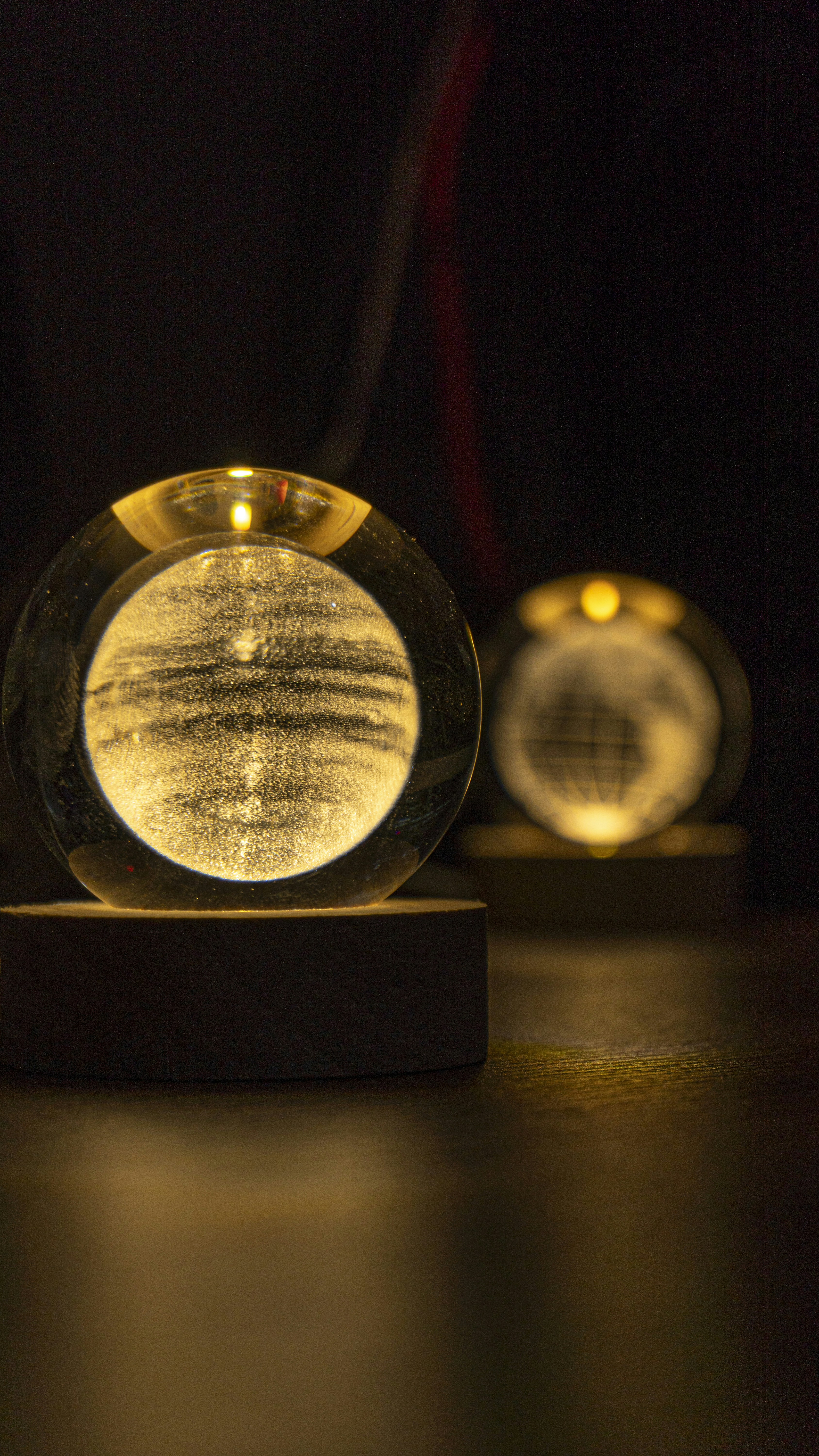 Glowing orbs illuminated with light.
