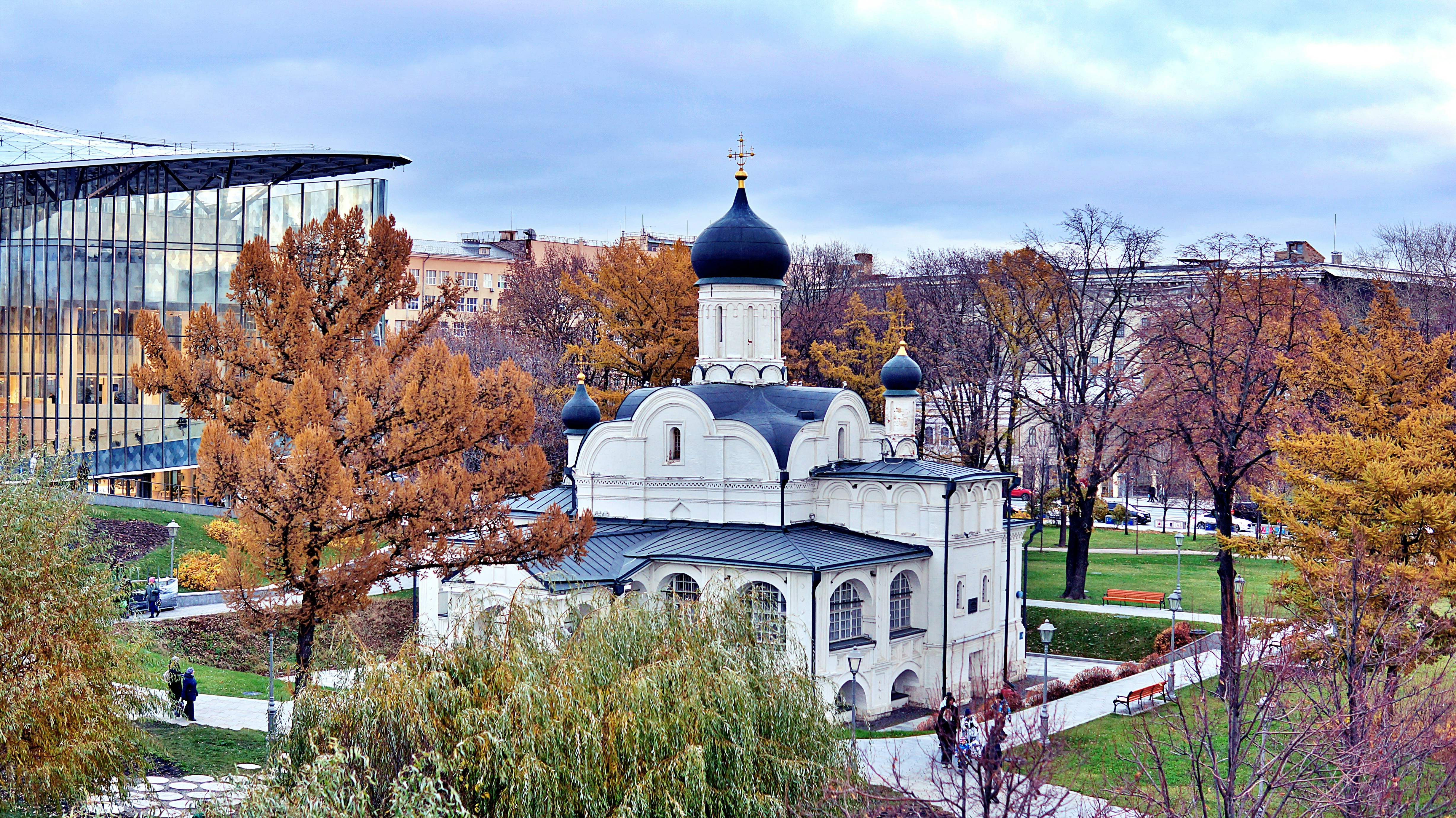 An orthodox church surrounded by fall foliage.