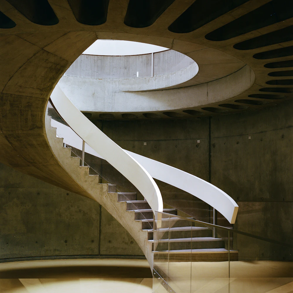 Cantilevered floating staircase in blackened steel