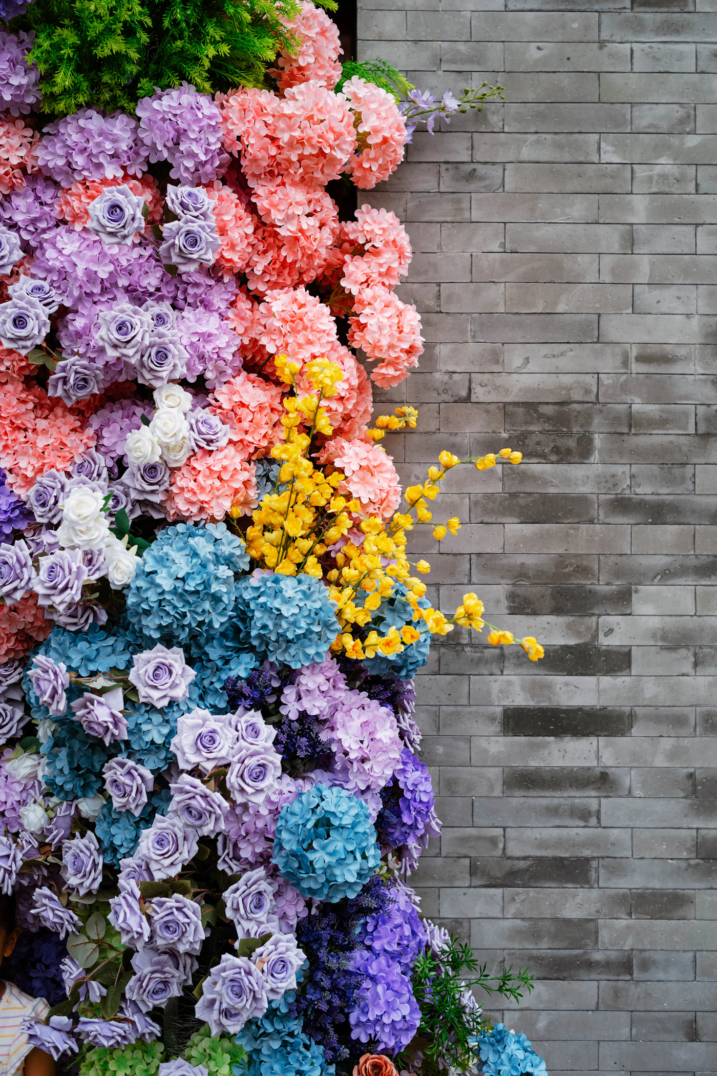 DIY backdrop ideas for sweetheart tables — Flowing chiffon fabric draped from a simple frame adds soft elegance to the reception.