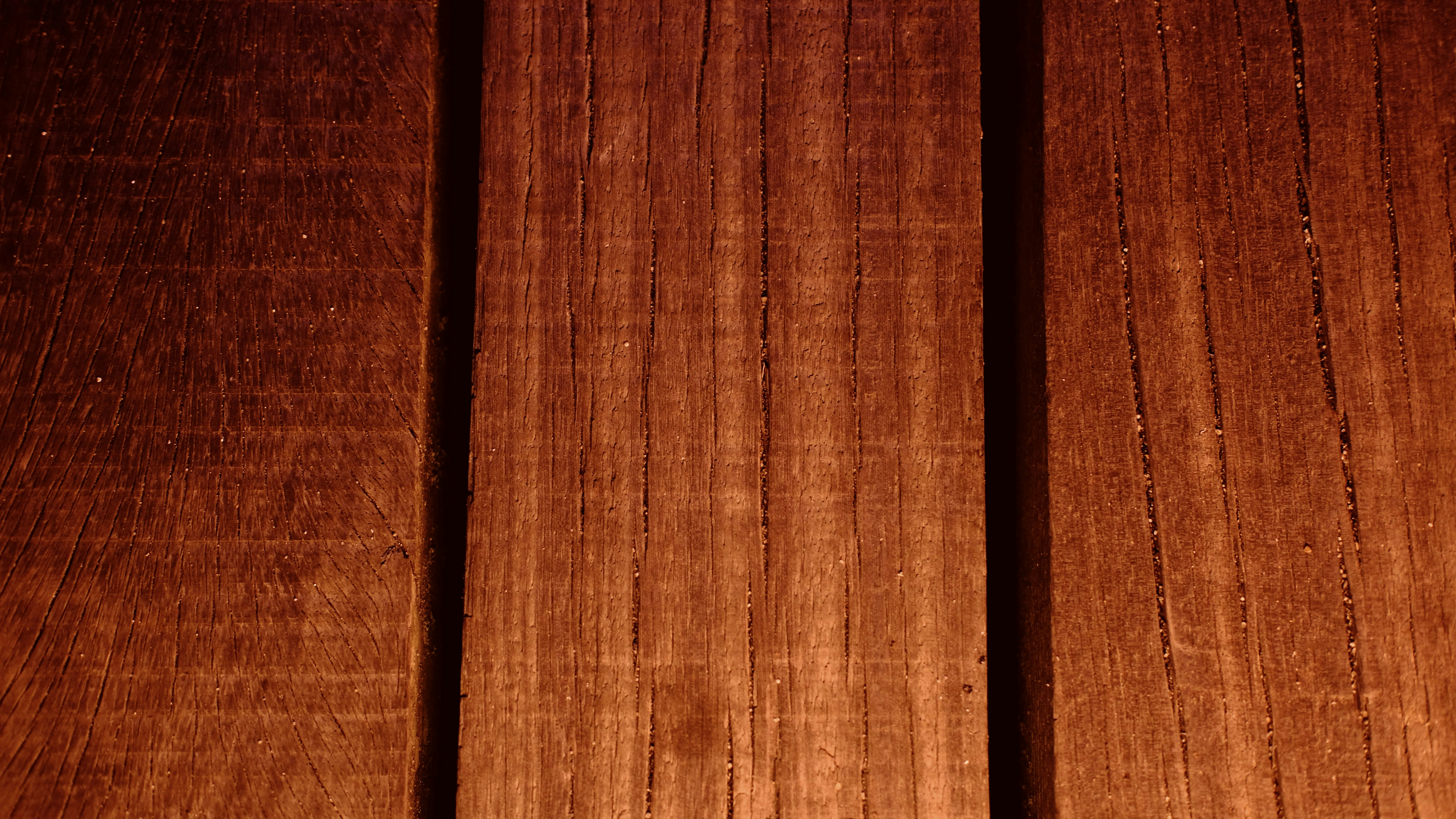 Wooden planks show their grain in a close-up.