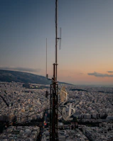 A tall tower overlooks a sprawling cityscape.