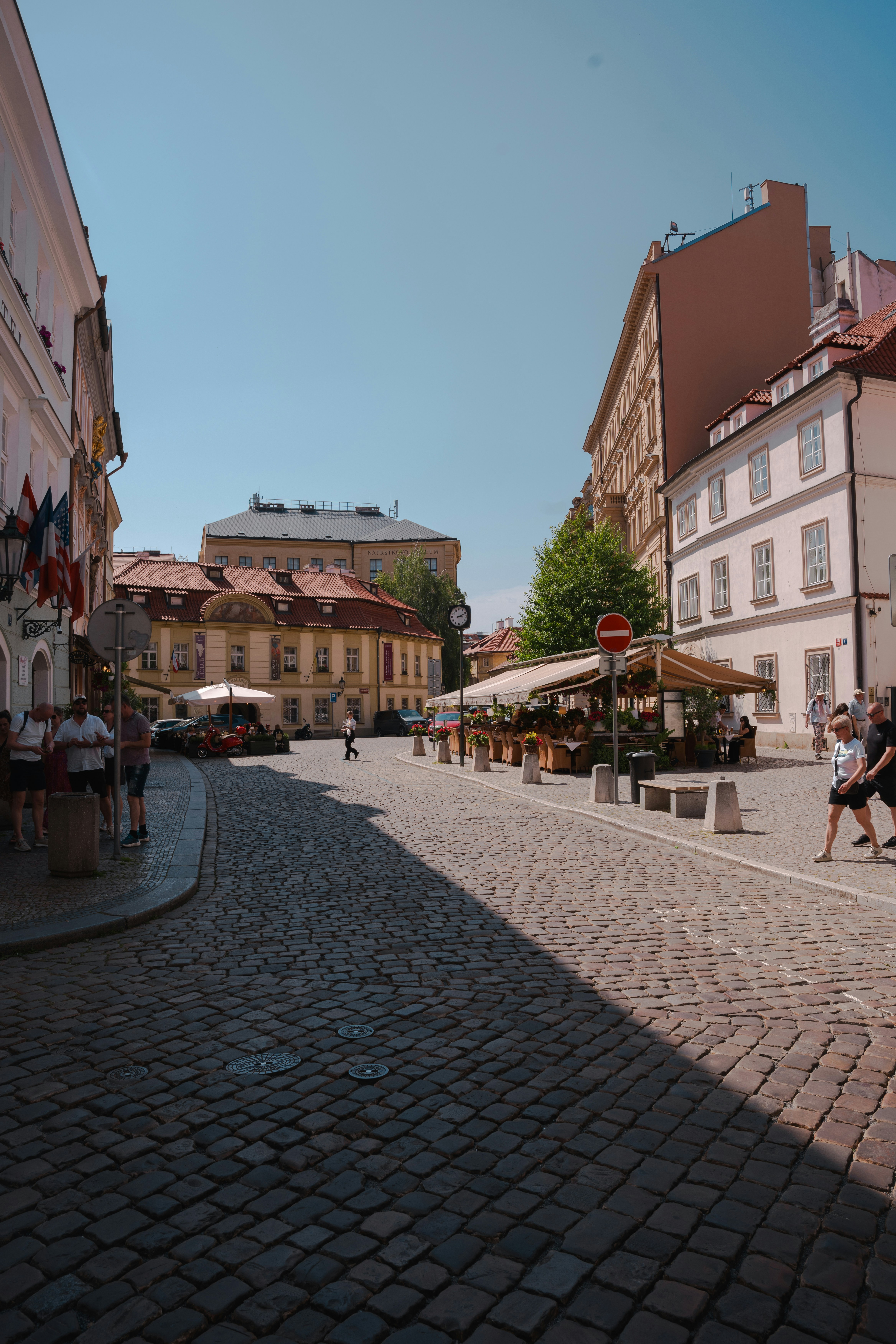 Cobblestone street in a european city on a sunny day.