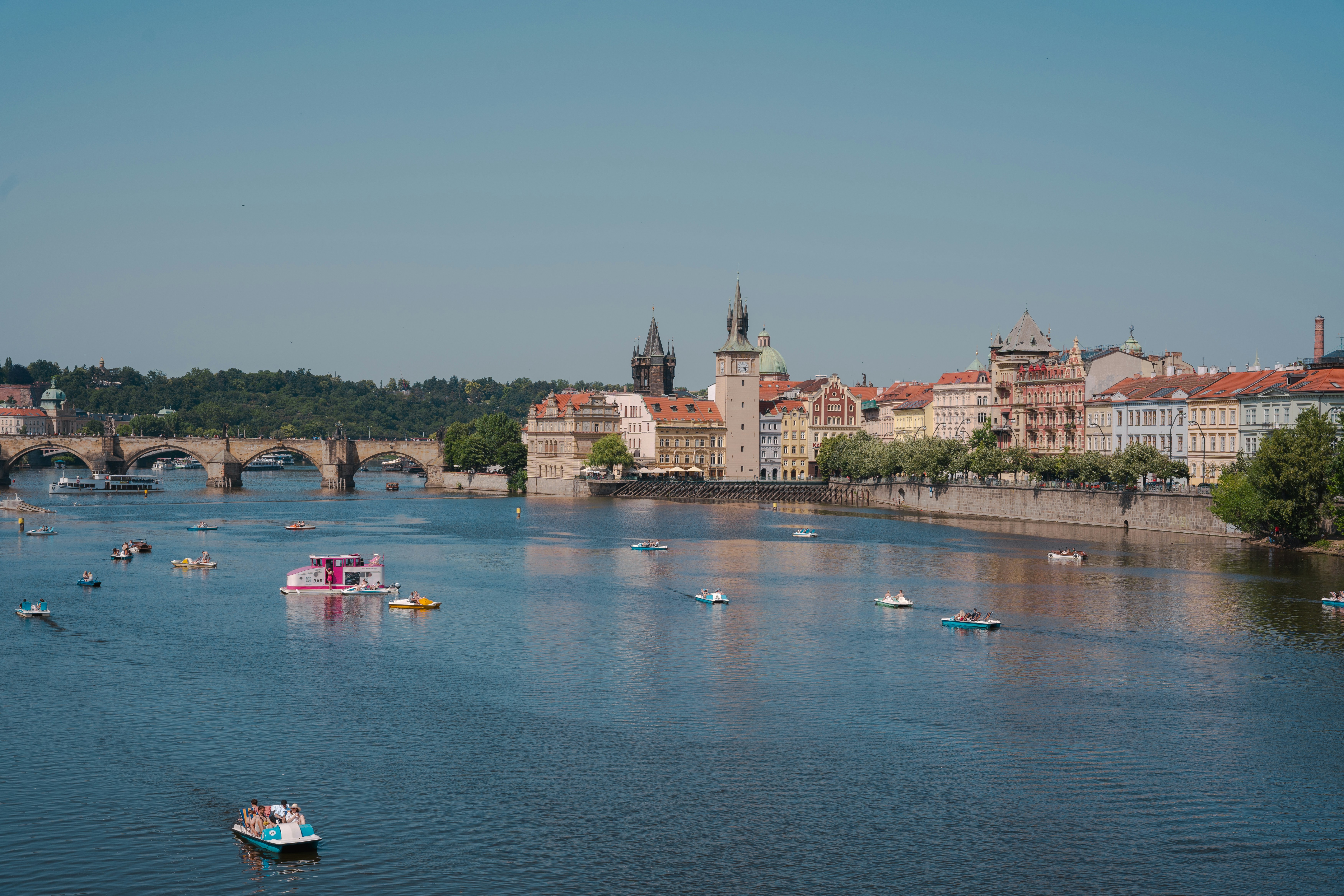 The vltava river flows through a beautiful city.