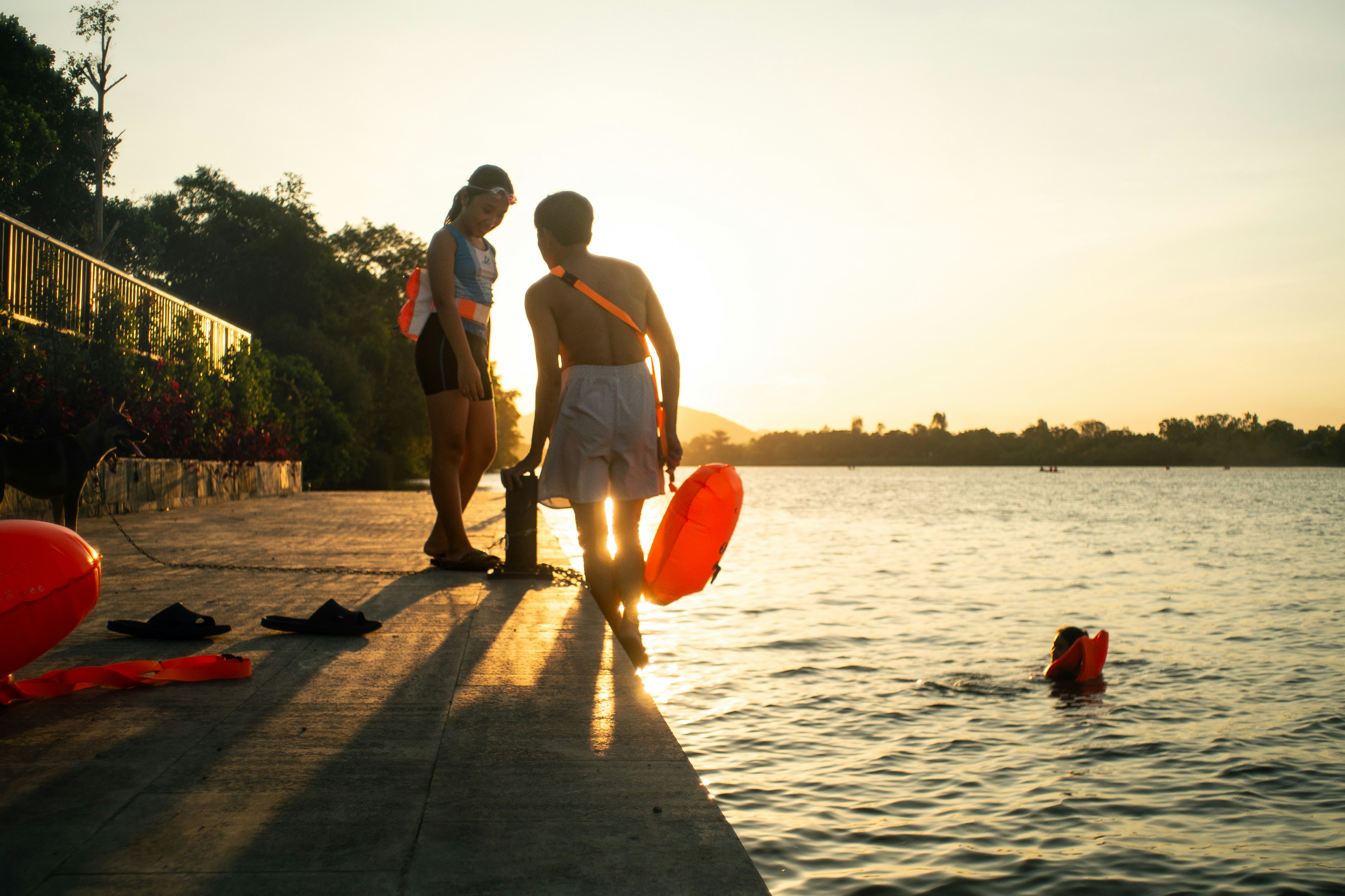 Lifeguards prepare for their duties at sunset.