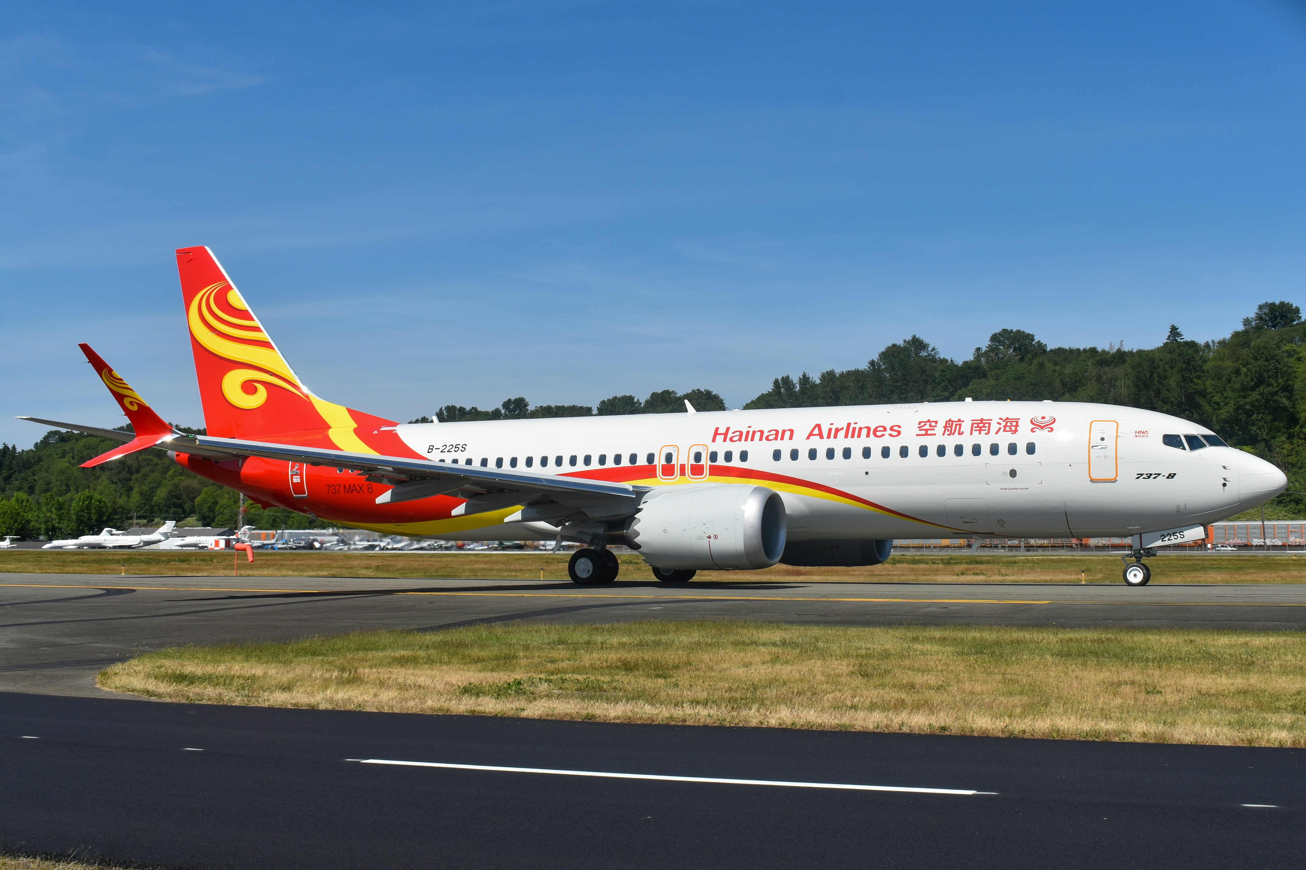A hainan airlines airplane sits on the runway.