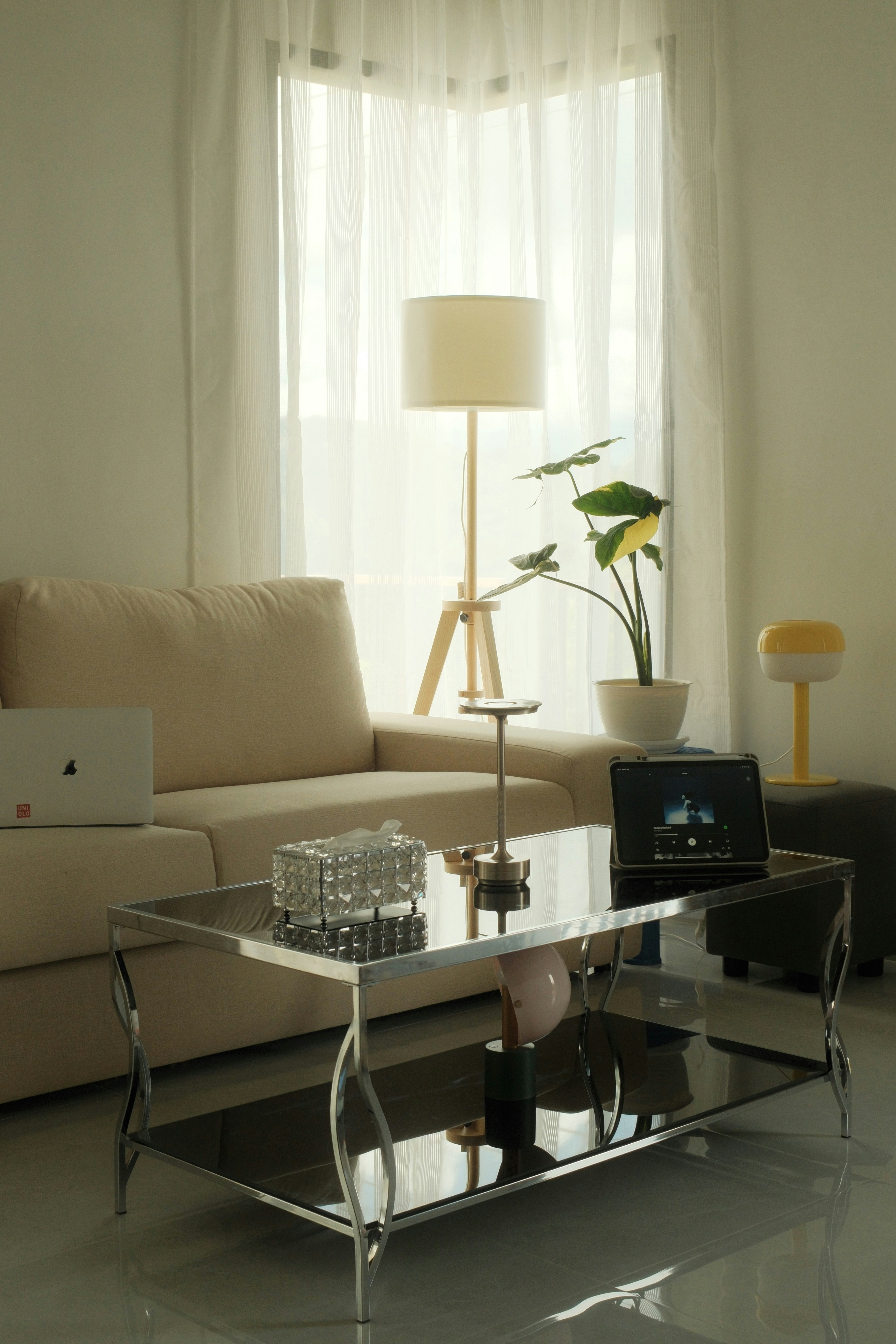 A cozy living room with bright sunlight.