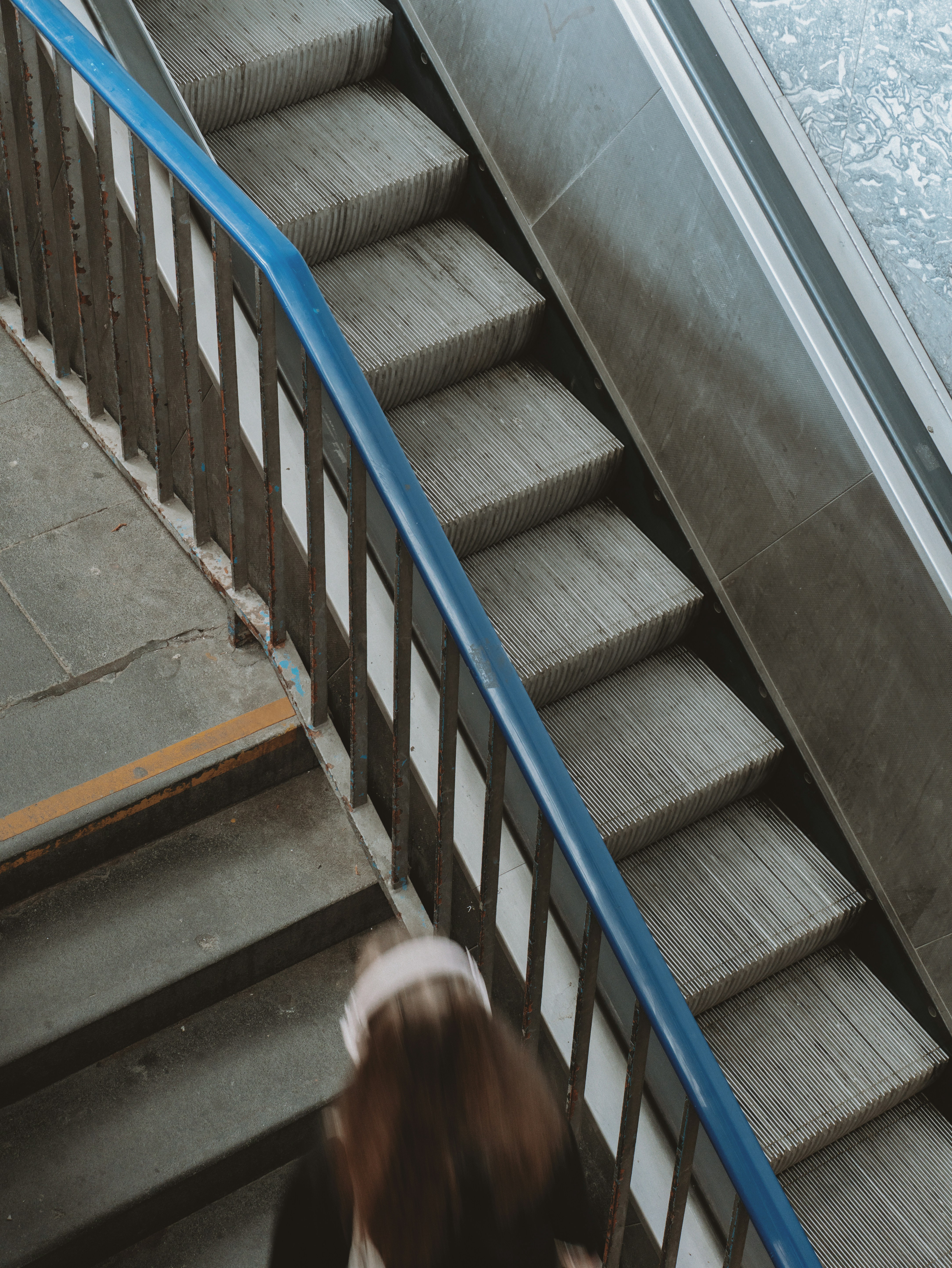 A person is walking up the stairs.