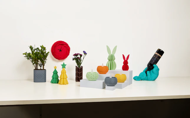 Several colorful decorations are displayed on a counter.