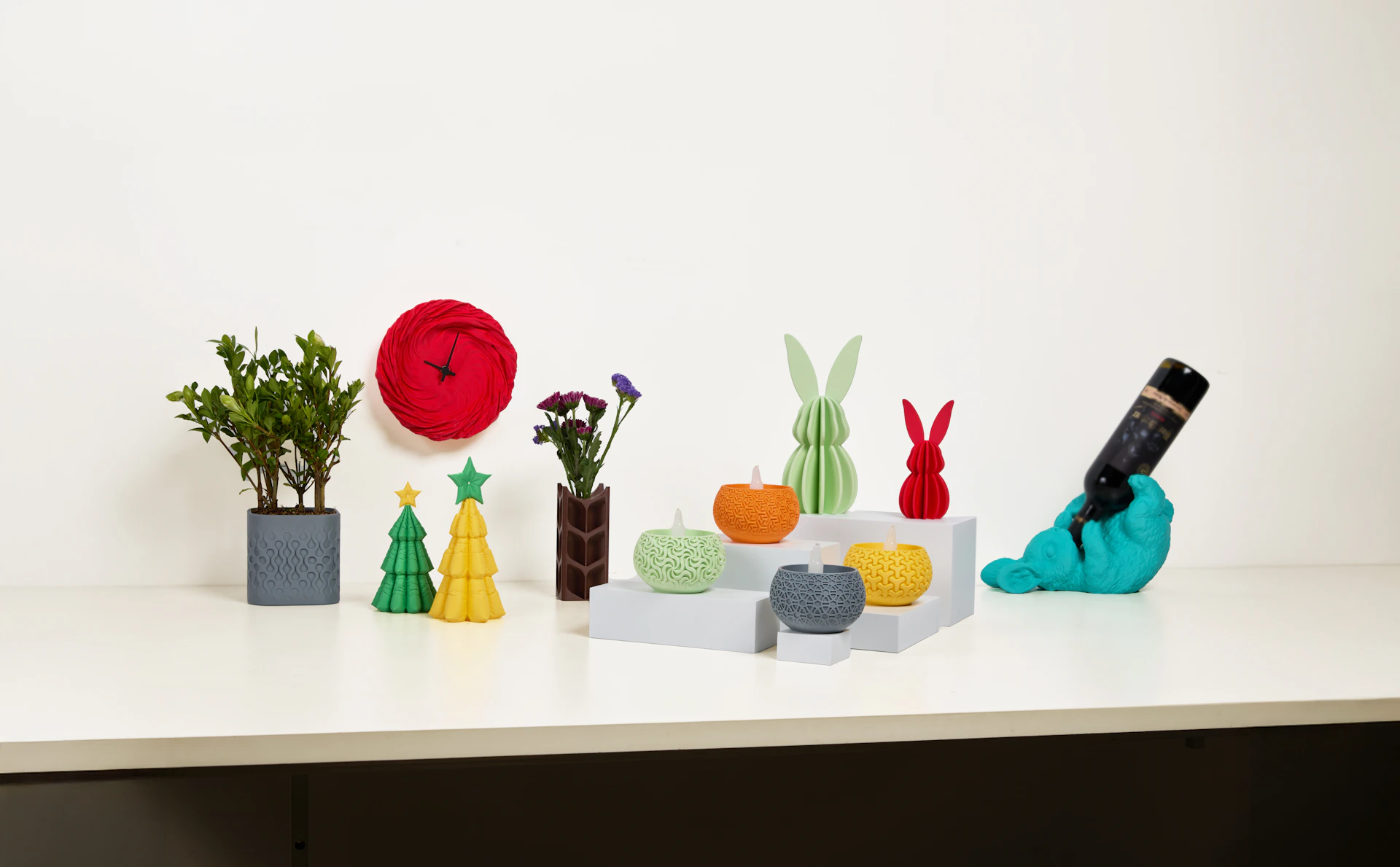 Several colorful decorations are displayed on a counter.