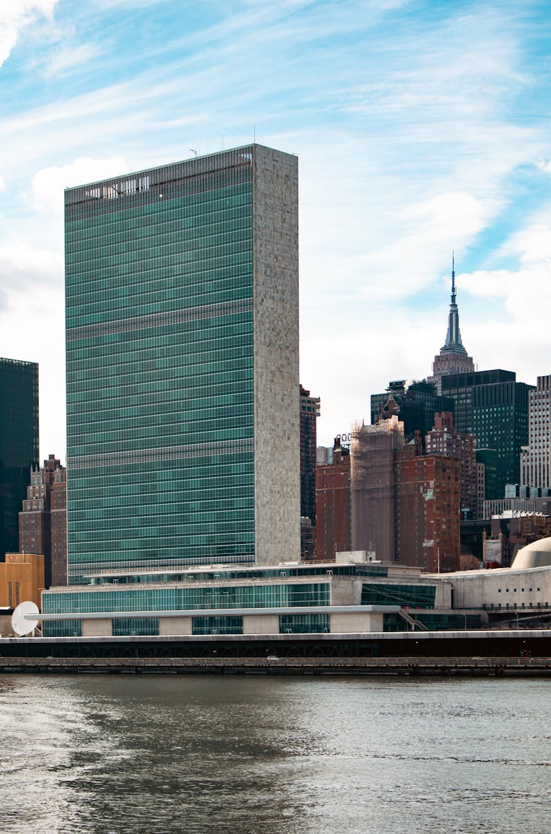 Geneva conference room, diplomacy meeting, nuclear test site, United Nations building
