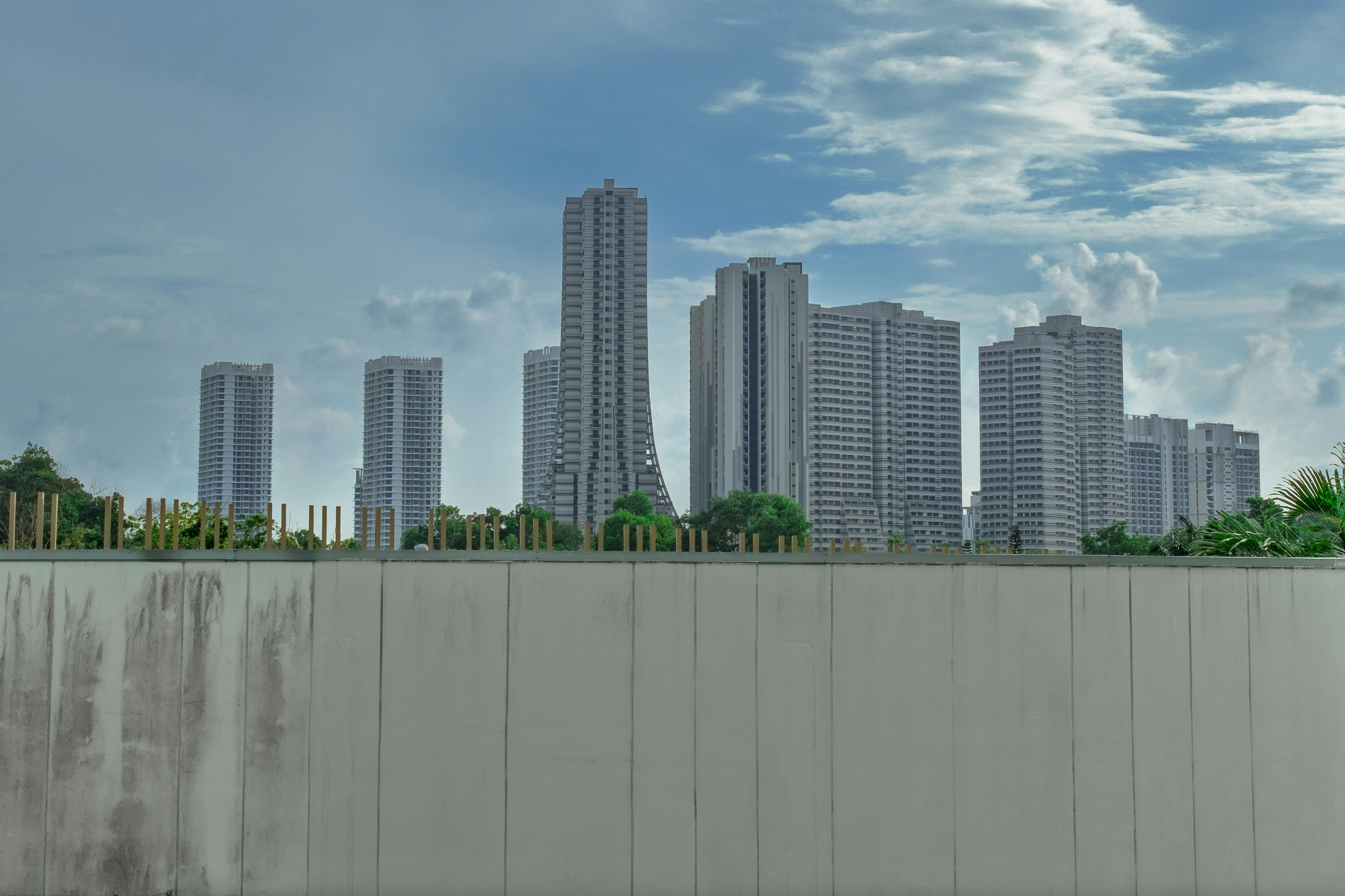 Cityscape with skyscrapers on a cloudy day.