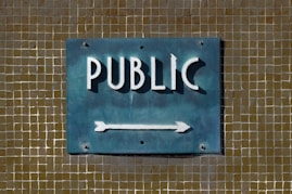 Public sign points to something.