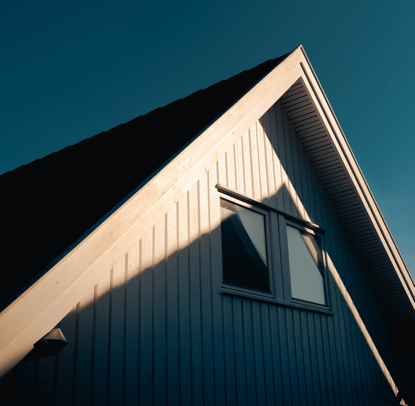 Exterior view of a residential roof after storm repair