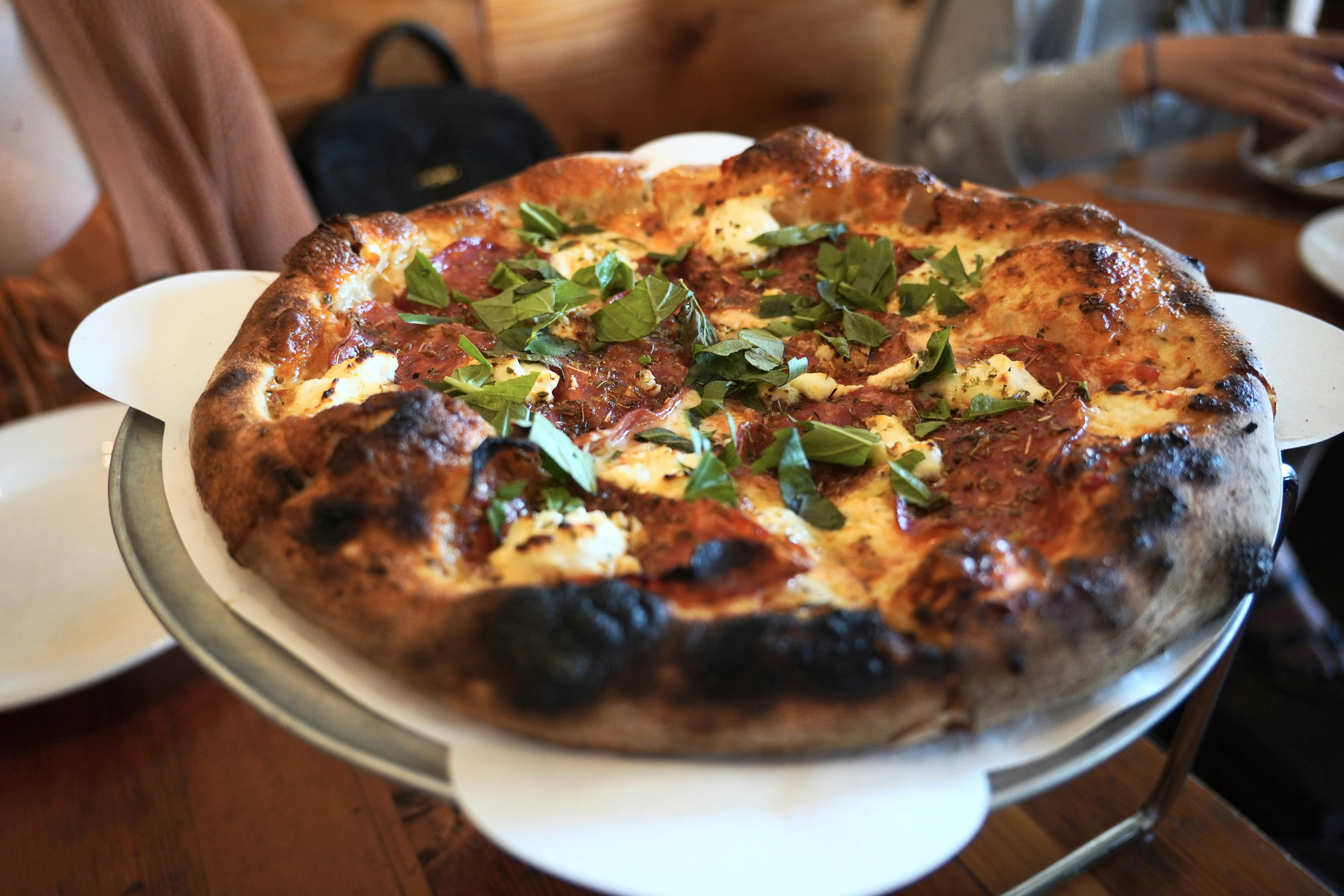 Gourmet pizza with ricotta and pepperoni