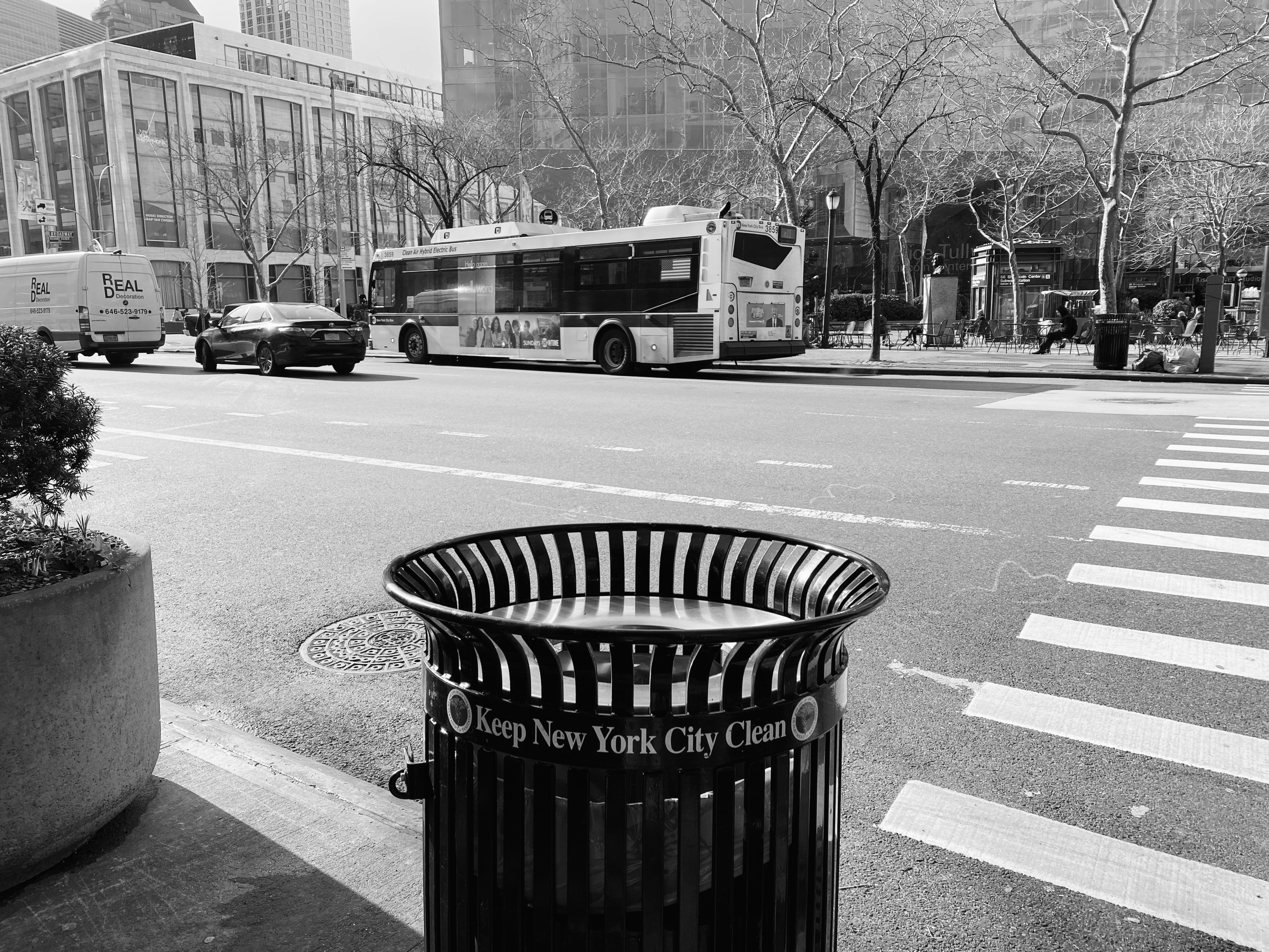 A new york city street scene in black and white.
