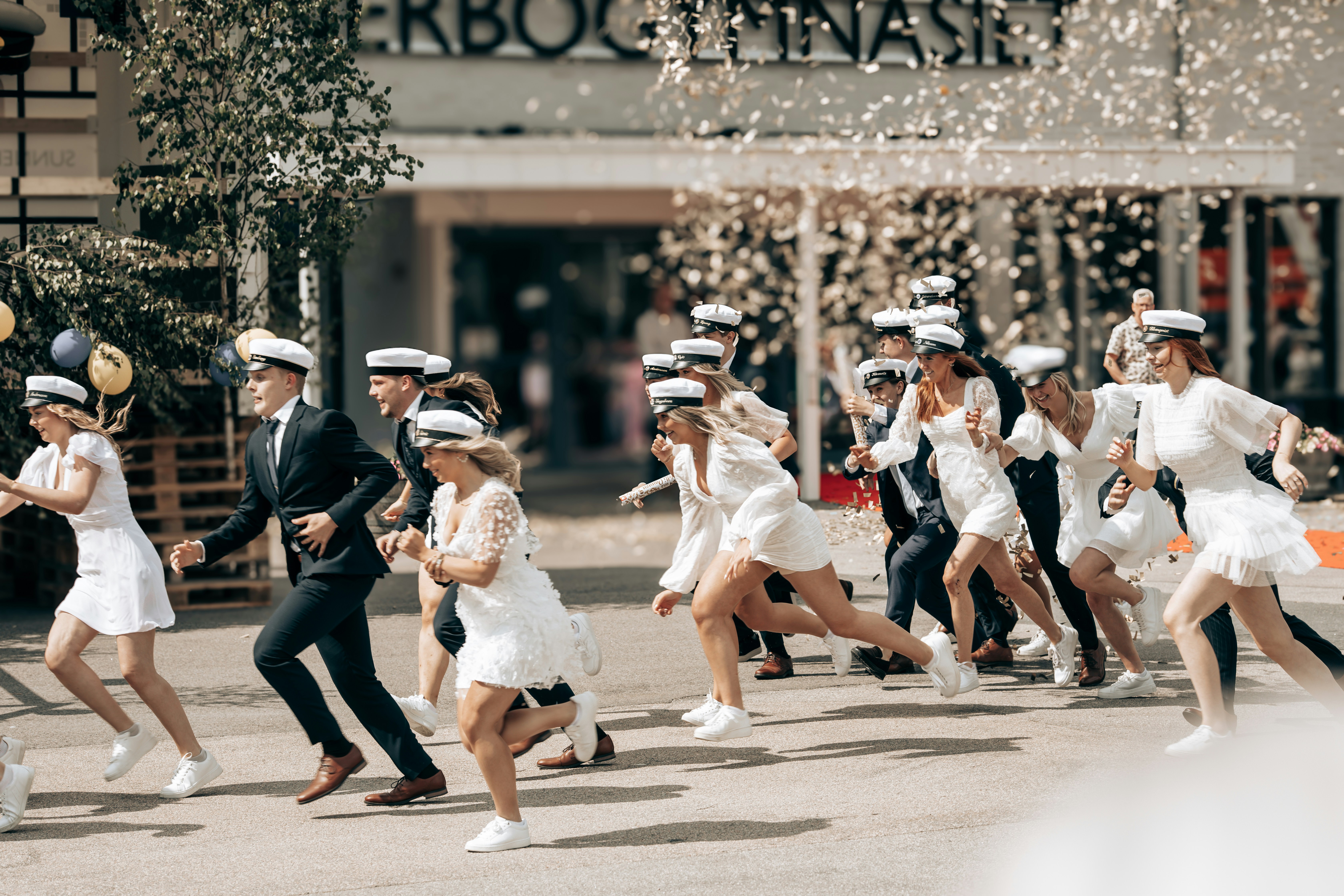 Graduates celebrate with a lively run after commencement.