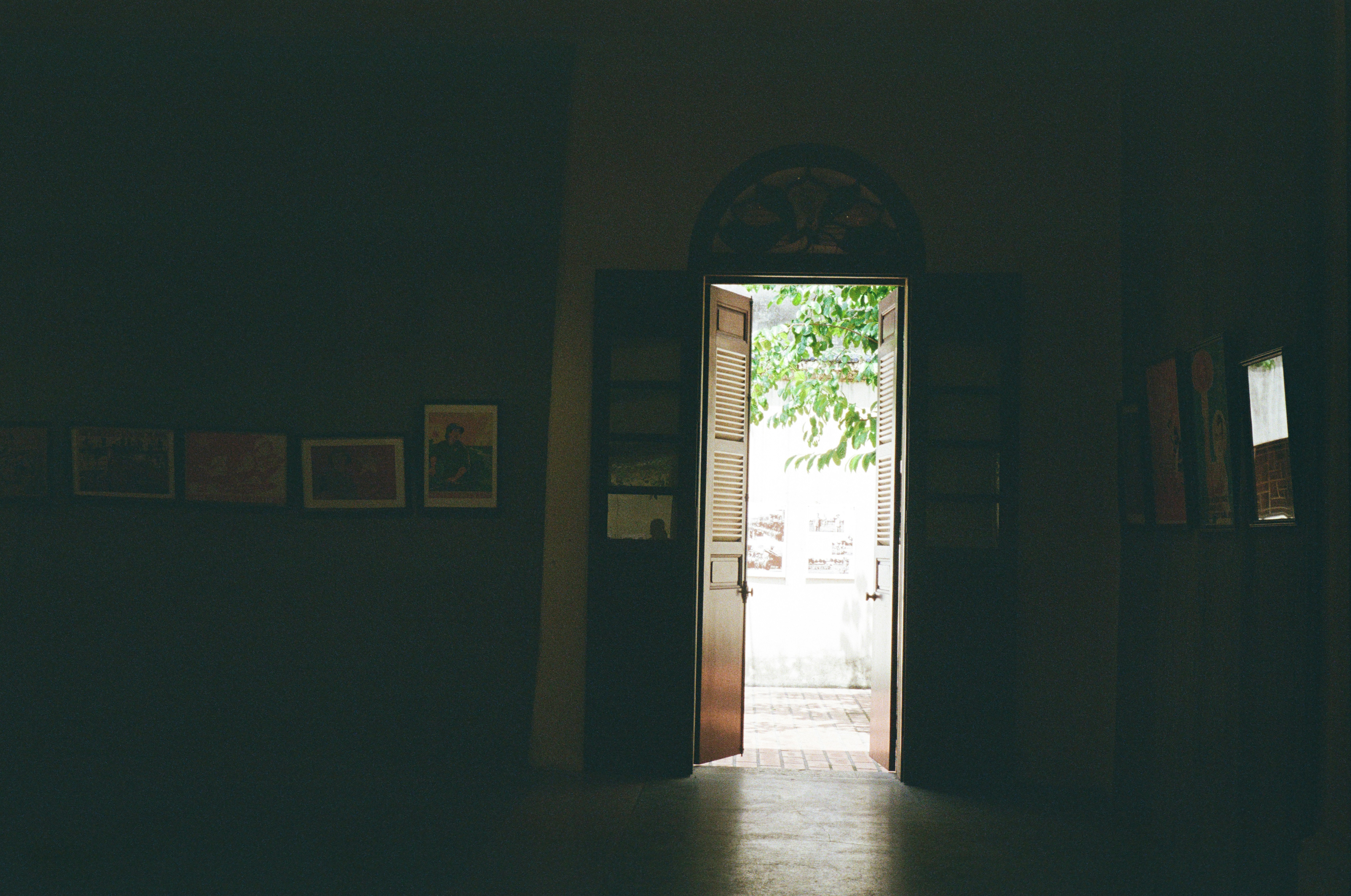 An open door offers a bright, welcoming light
