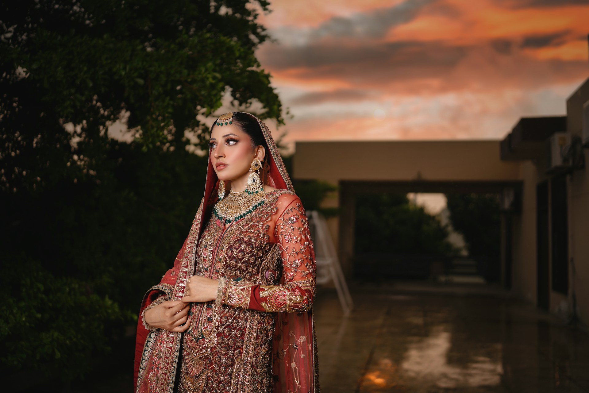 A bride poses in her wedding attire.