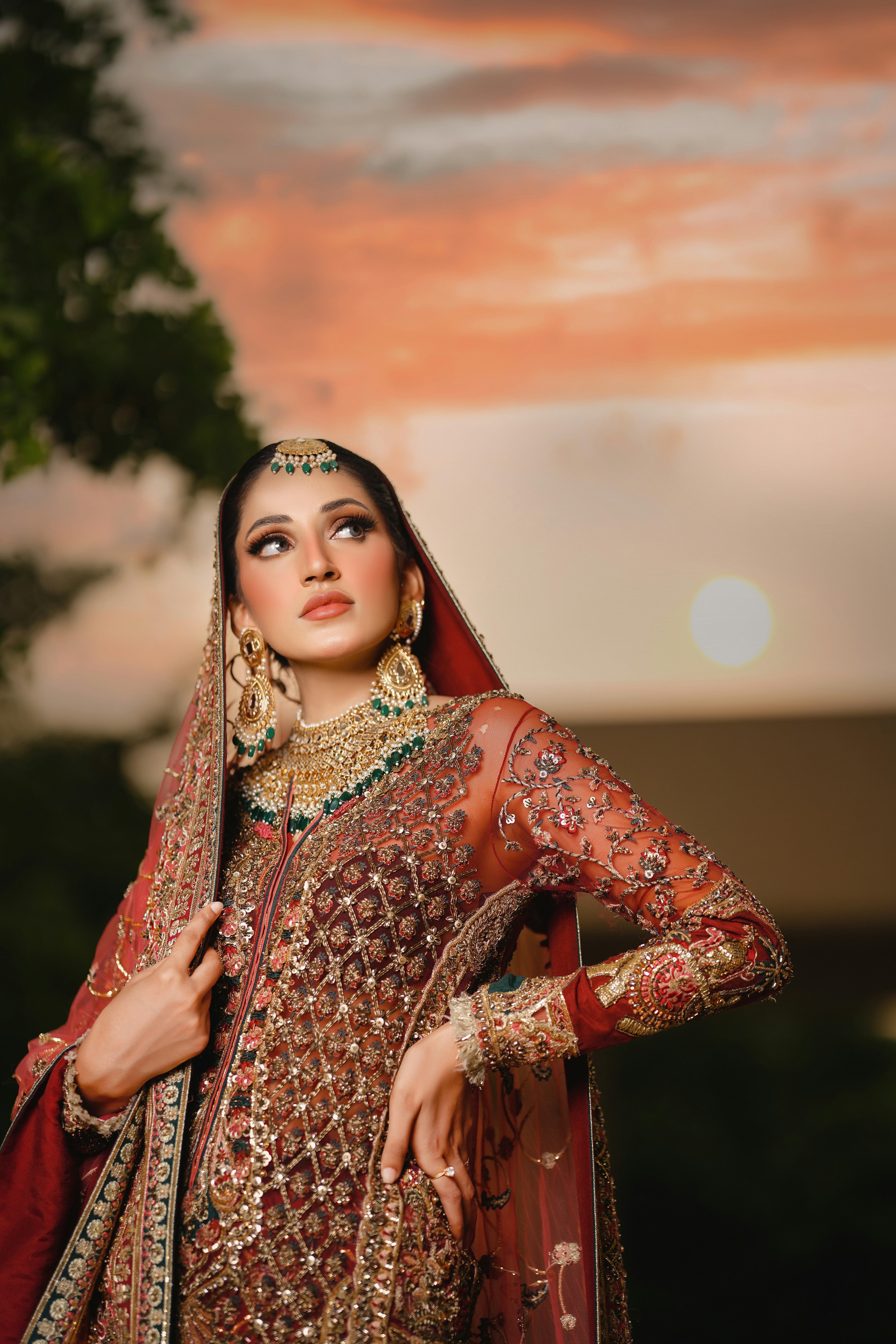 A beautiful woman in elaborate wedding attire.