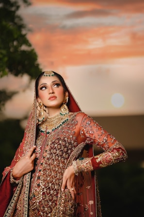 A beautiful woman in elaborate wedding attire.