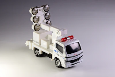 Toy truck with spotlights and a siren.