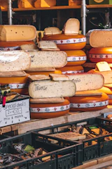 Various types of cheese are for sale.