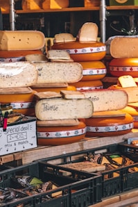 Various types of cheese are for sale.