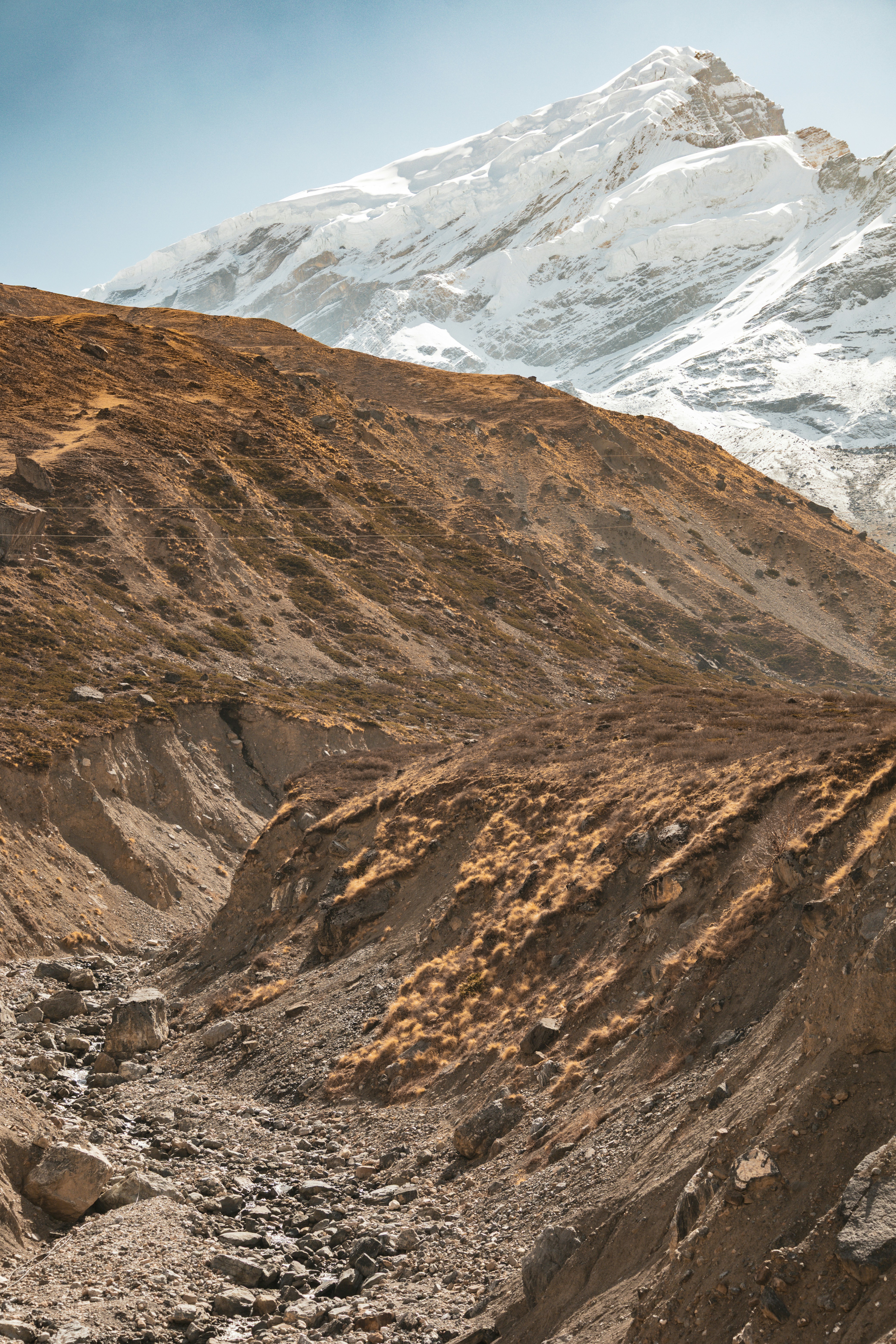 Mountain landscape with snowy peaks.