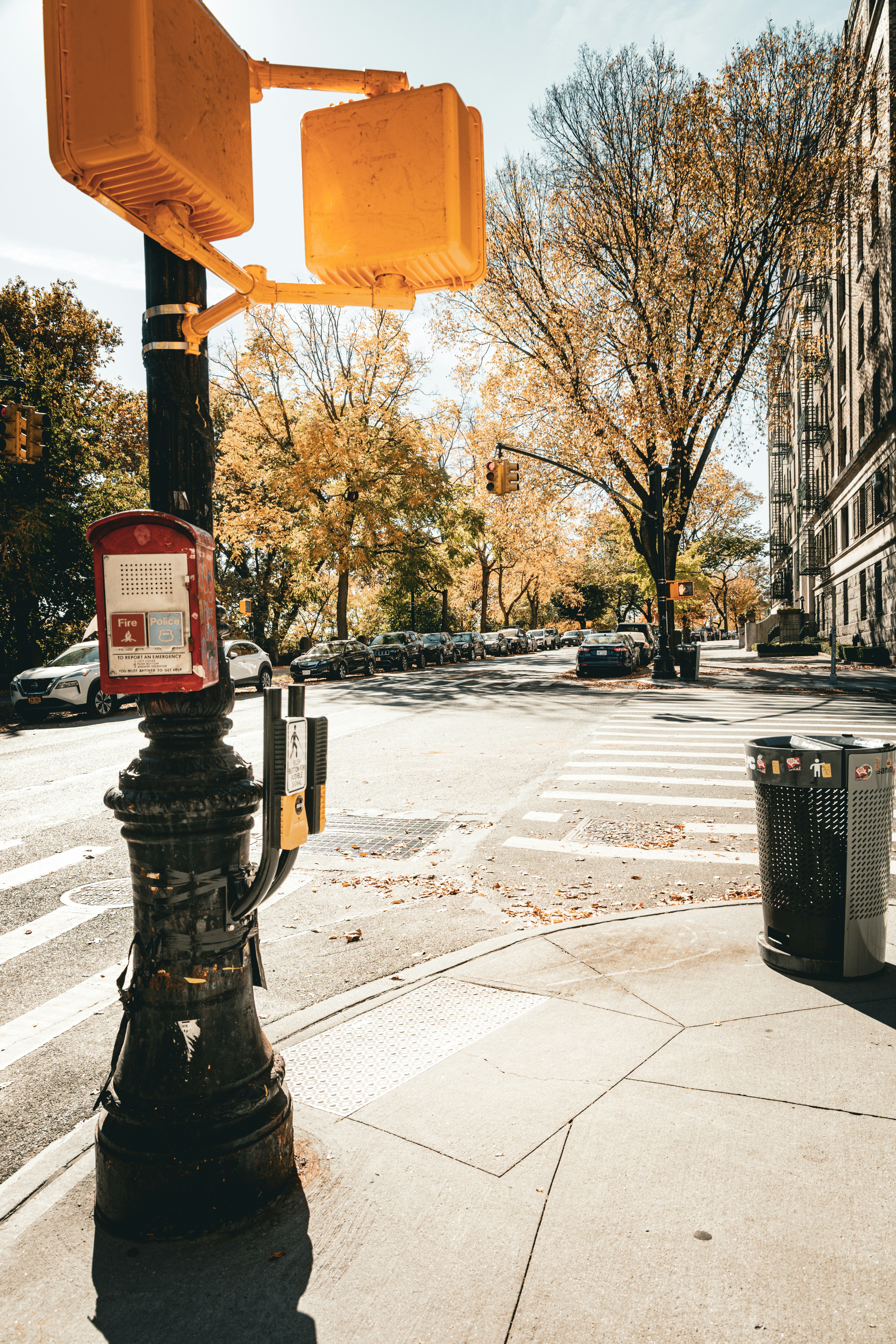 A city street intersection on a sunny day.