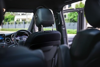 Inside the car, looking toward the driver's seat.