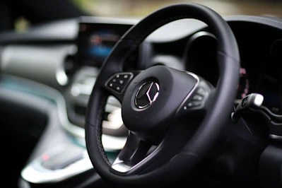 A mercedes-benz steering wheel is shown.