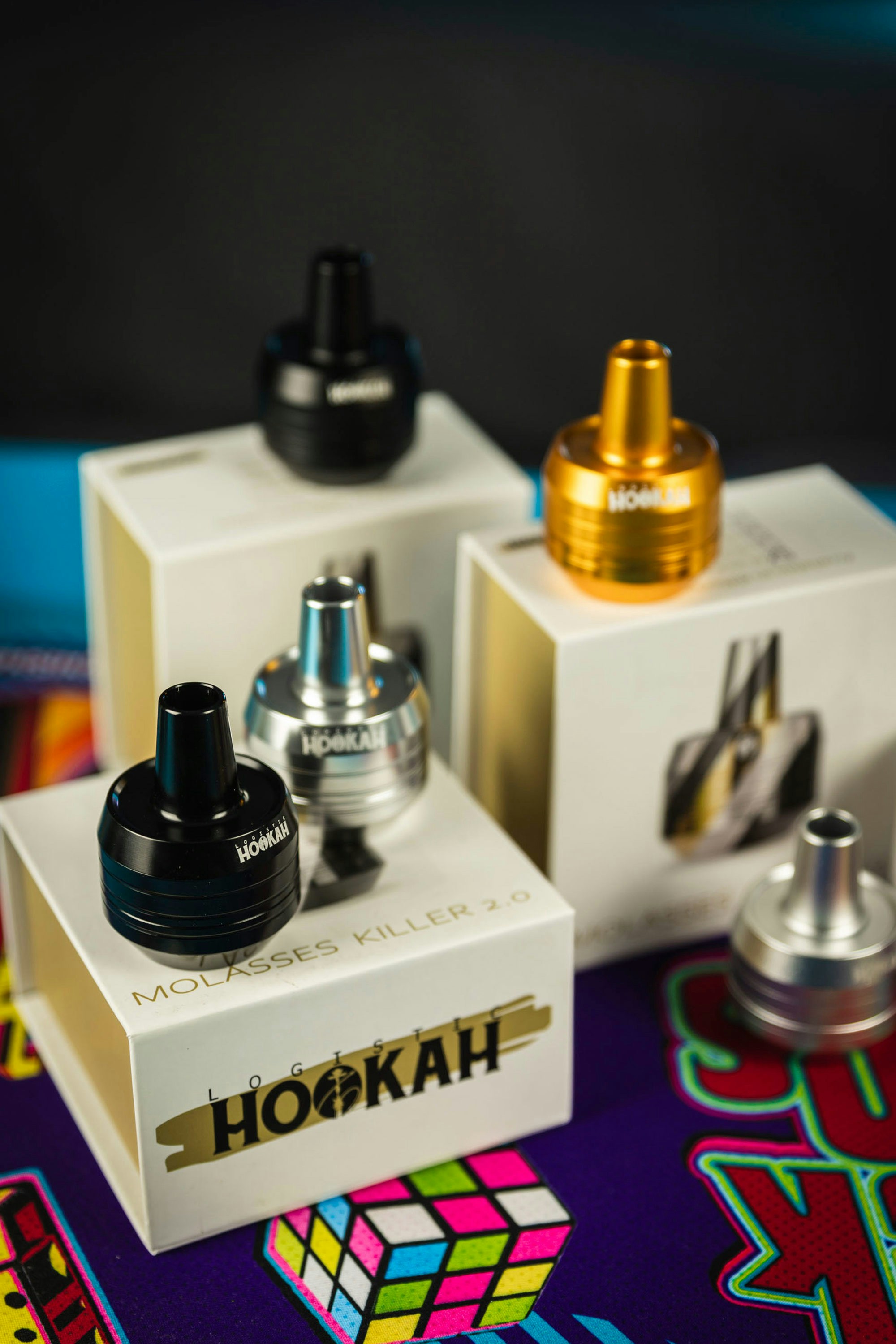 Hookah heads sit on their boxes.