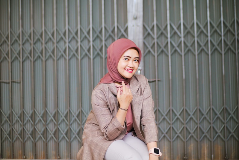 Sophisticated woman in hijab smiling confidently