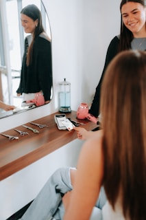 A customer pays at a hair salon.