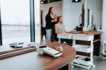 Salon scene: a haircut and credit card reader