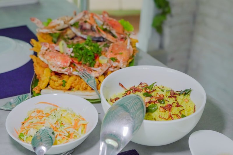 Sri Lankan crab curry with yellow rice and fresh salad