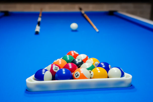 Pool balls are ready for a game of billiards.