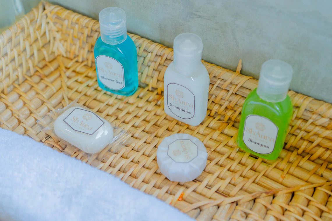 Bath and shower care products arranged neatly in a protective basket
