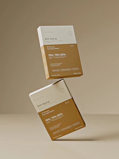 Two anti-aging product boxes are suspended in mid-air.