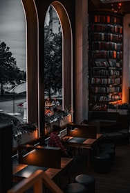 Inside of a cozy bookstore cafe, with a view.