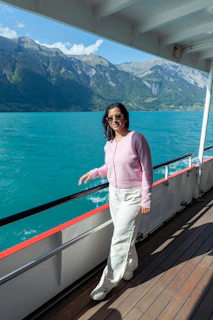 Woman smiles while enjoying a boat ride