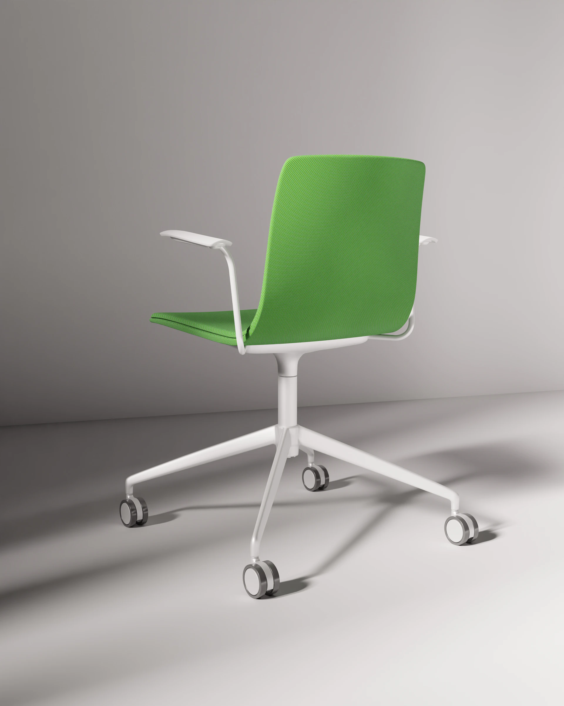 A modern green and white office chair.