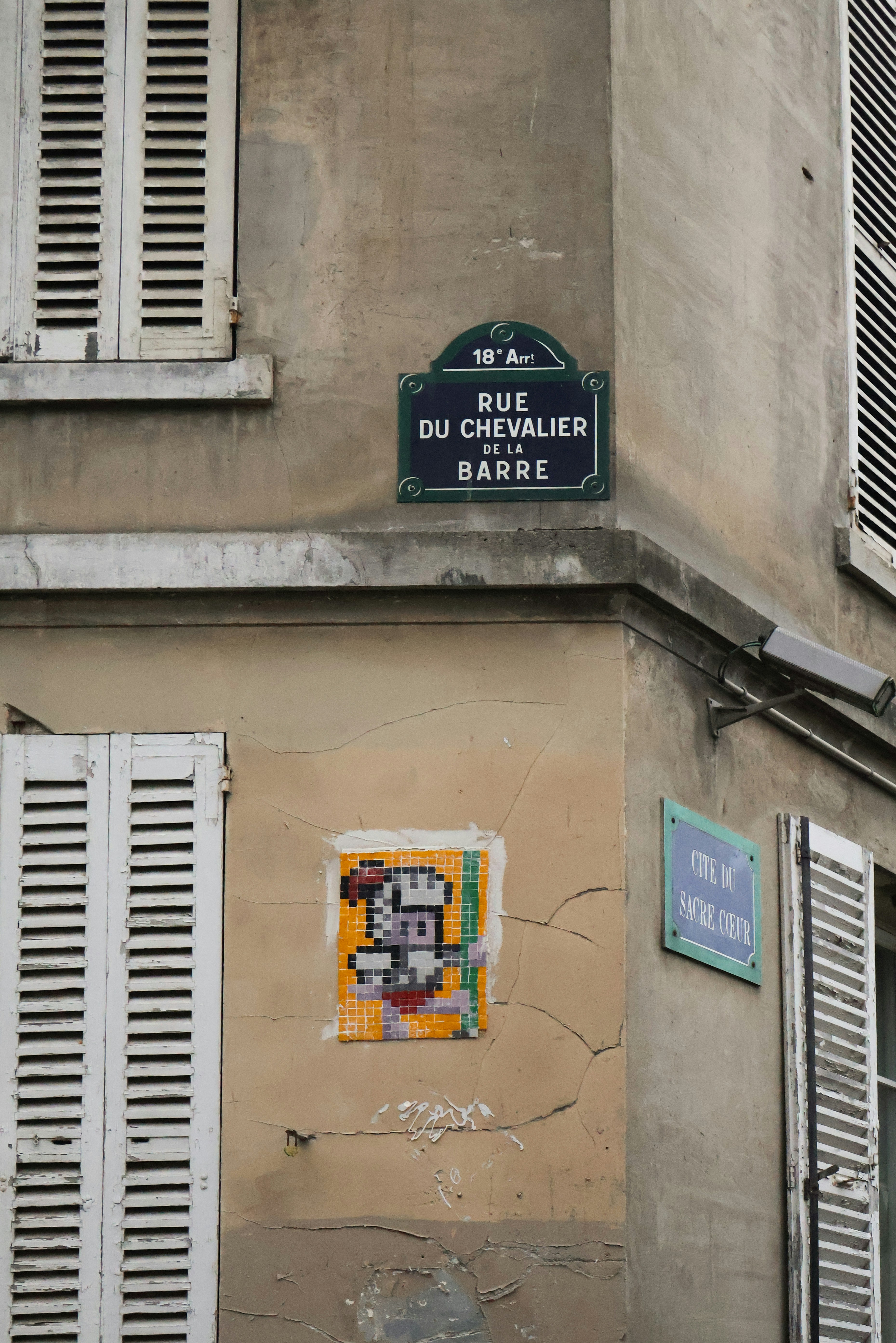 Paris street corner with street art.