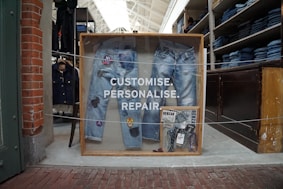 Jeans are displayed with customisation and repair options.