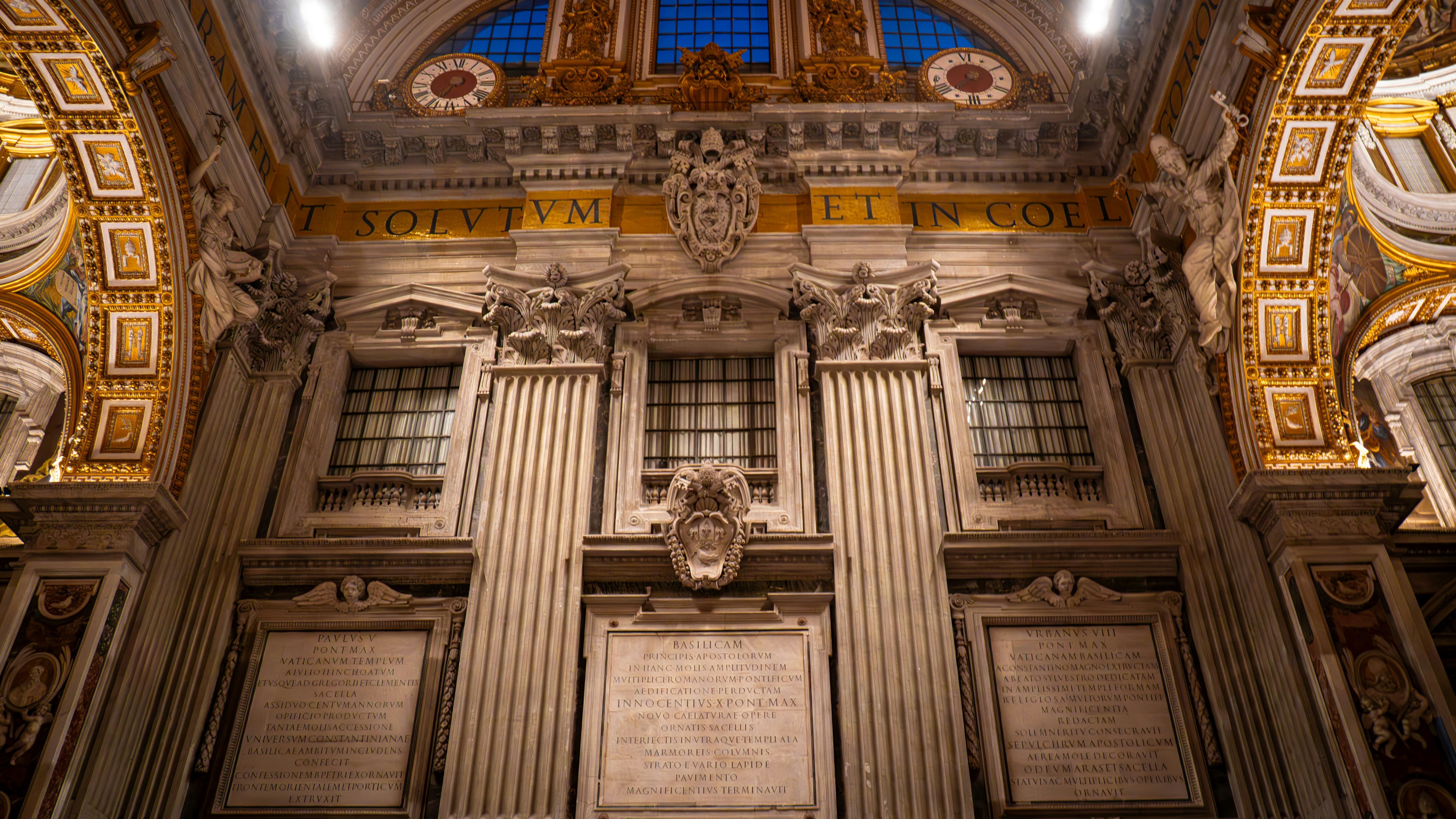 Inside a decorative, old building's interior.