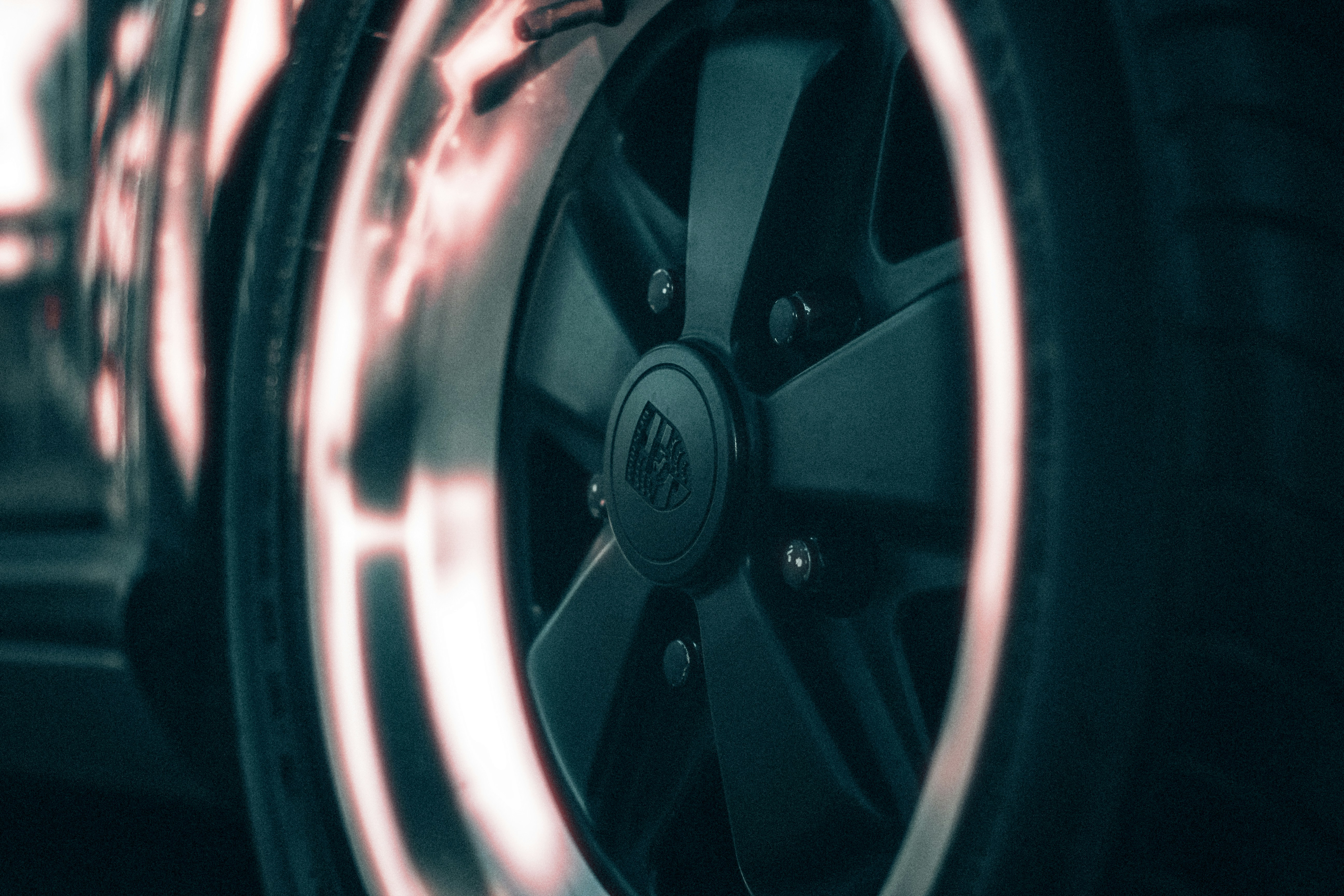 Tesla Model S and Model X parked side by side in a driveway