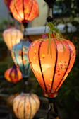 Colorful lanterns illuminate in a beautiful display.