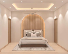 A modern bedroom with a stylish, neutral aesthetic.