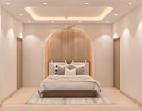 A modern bedroom with a stylish, neutral aesthetic.
